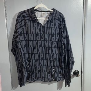 Selling a windbreaker. Has a little tear on it from dryer.